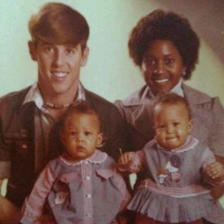 Darlene Mowry with her husband and twin daughters